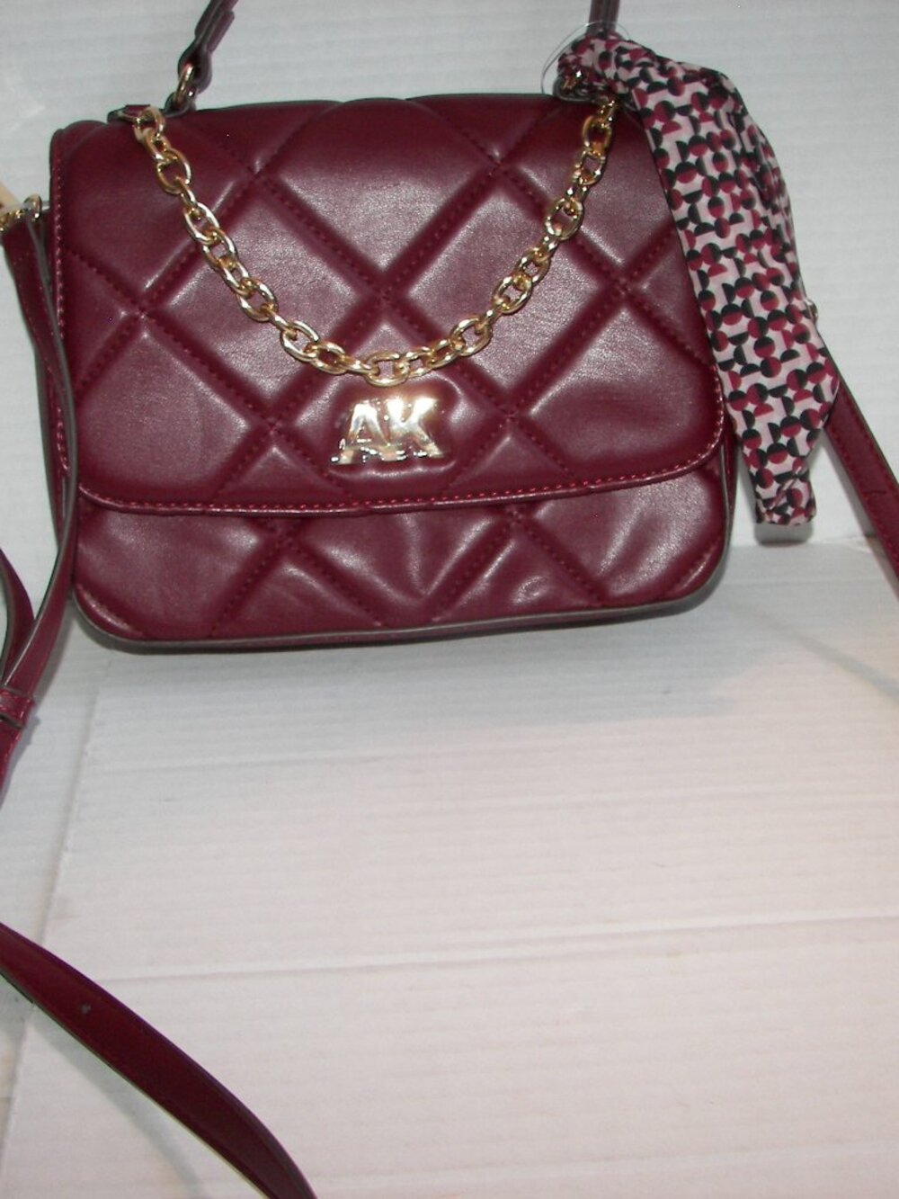 Anne Klein burgundy quilted hand hold and shoulder carry minibag with tags